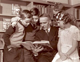 Charles R. Sanderson, TPL chief librarian, at the opening of East York  children's libraries, 1945.
